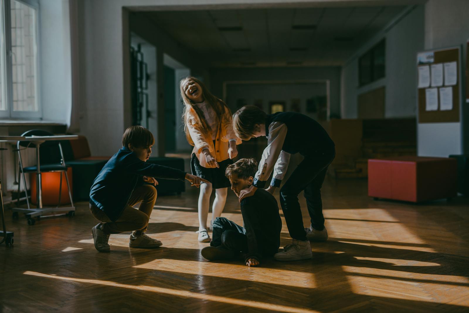 A Kid Getting Bullies by Classmates in School